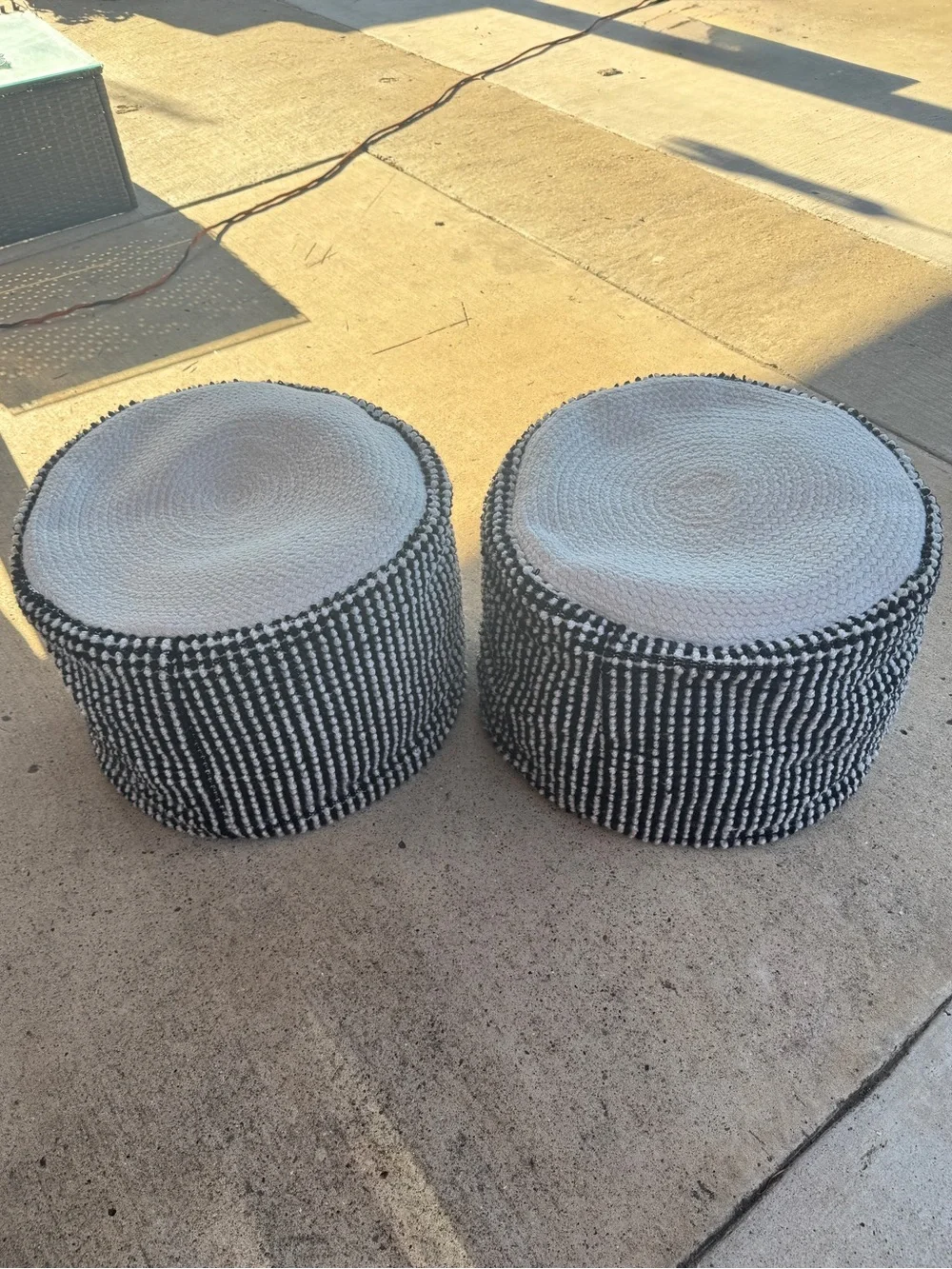 Round Woven Pouf Ottoman in Black and White - Neutral Accent (set of 2)